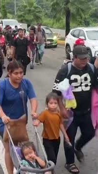 Hundreds of Migrants Trek Through Mexico As Caravan Approaches US Border #shorts