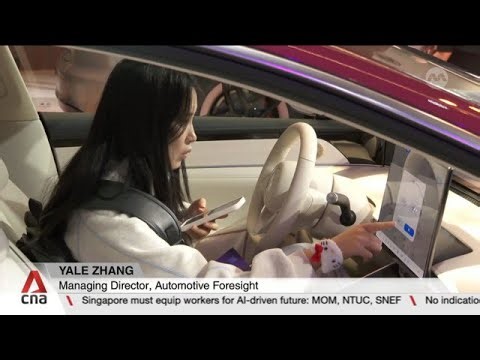 Beijing Auto Show: EV companies race to attract consumers with smart driving technology