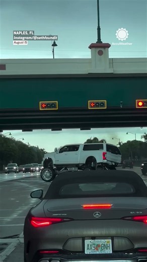 Florida Man's Truck Spins Out on Wet Road, Goes Wrong Way!