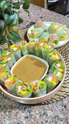 Quick and Easy Kani Salad Spring Rolls Kani Salad Spring Rolls Recipe Imitation Crab Sticks Cucumber Carrots Mango Rice Paper Wrapper Peanut Sauce 2 tbsp Peanut Butter 1 tbsp Honey 1 tsp Sesame T 4 tbsp milk 1 tsp lemon juice Enjoy! | NANNA COOKS