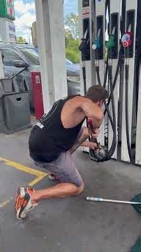 Large Carpet Python Removed From Below Gas Pump