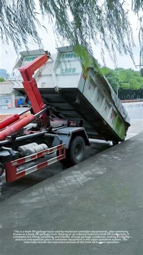 Hook type garbage truck lifts and transfers waste container