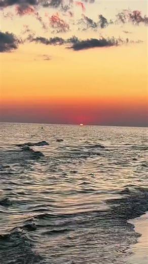 Watch this perfect beach sunset in real time