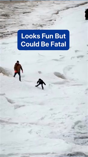 Sliding on Lake Michigan looks fun, but it’s very dangerous. If you don’t wan’t to fall into frigid waters, stay off the ice shelf! | The Weather Channel