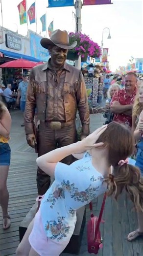 She Kissed the Cowboy Statue… But He Kissed Back! 🤠💋