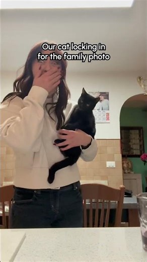 Adorable Cat Waves When Parents Do