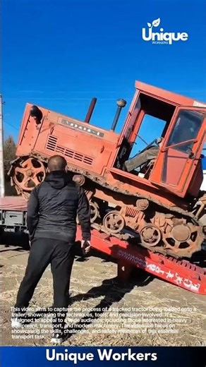 Loading Heavy Bulldozer onto Truck: Tracked Machine Climbs Ramp Carefully
