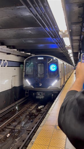 R211 (C) train arriving at 42nd Street bound for Euclid Avenue in Brooklyn.
