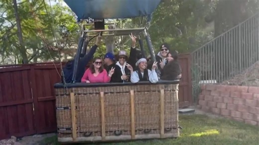 Pilot of hot air balloon carrying 13 people makes emergency landing in California backyard