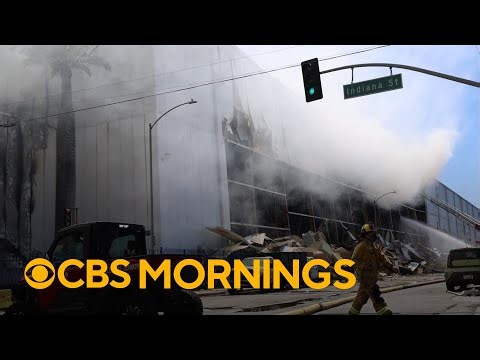 Massive warehouse fire burns for days in LA, prompting environmental and health concerns