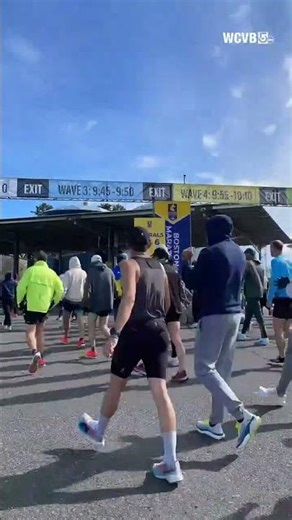 Thousands of athletes head toward the starting line for 130th Boston Marathon