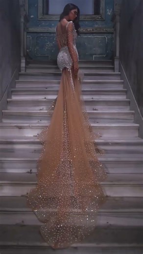 Share with a friend who would own the spotlight in this champagne nude mermaid gown! To order, send