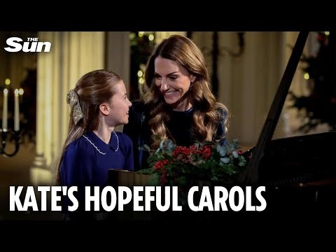 Sweet moment Charlotte gazes up at mum Kate as they play piano at Christmas carol concert
