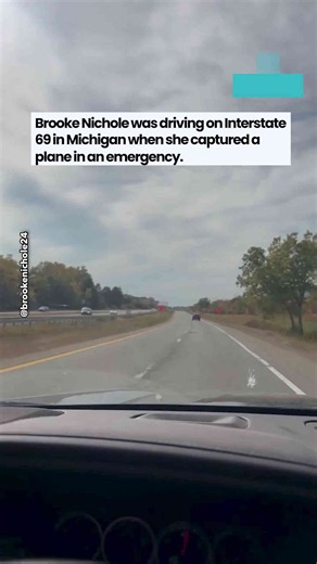 Michigan driver captures plane in emergency while driving on the highway