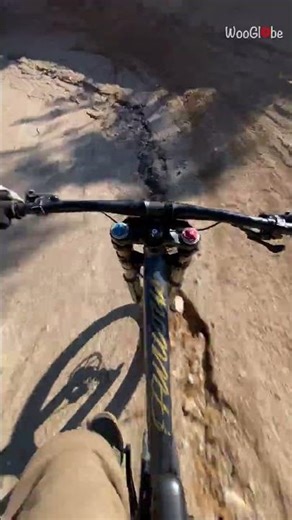 Sports Mishap: Mountain Biker Falls and Injures Foot on Trail || WooGlobe
