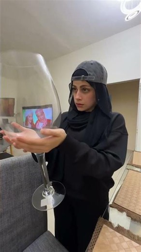 this girl bring a big glass