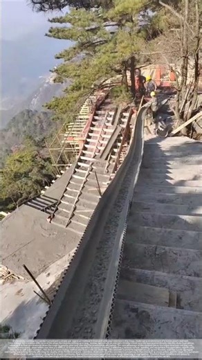The process of pouring concrete for the slide and steps in the scenic area.
