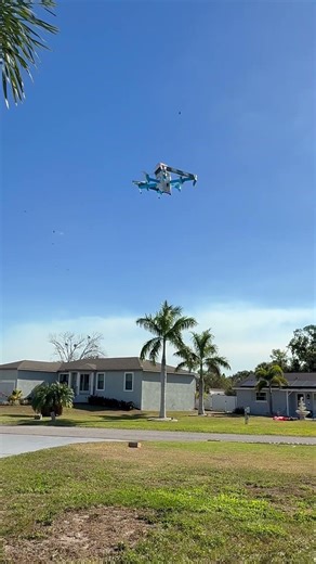 Amazon Delivery Drone Drops Off Package in Front Yard