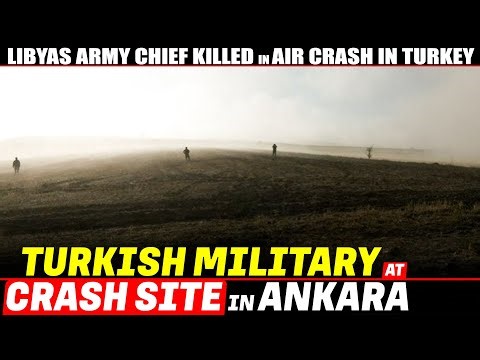 Turkish military personnel comb area near crash site of jet carrying Libyan chief of staff