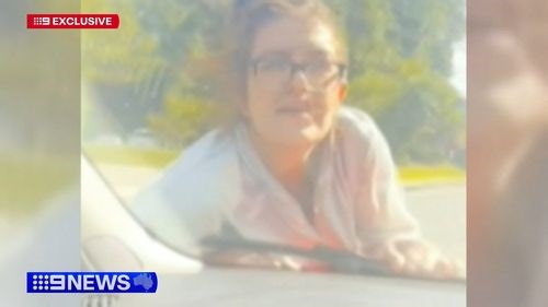 Woman clings to bonnet in Gold Coast road rage incident