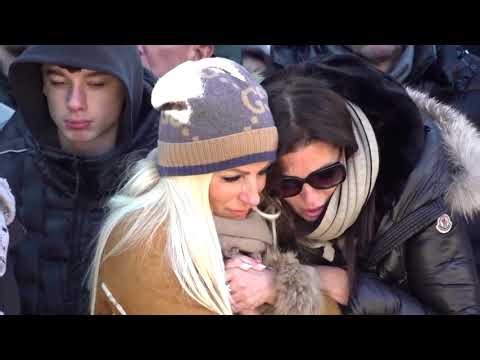 Swiss bar fire victims mourned as ID process continues | REUTERS