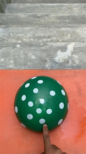 Experiment: Dropping a polka dot water balloon from the top of the stairs, does the balloon explode?