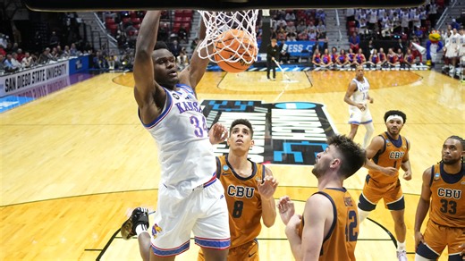 Paul Mbiya reacts to Kansas basketball's win vs California Baptist