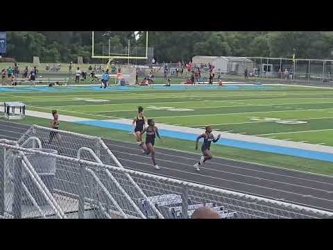 Girls 100m dash heat #1 at 4A District 9 Meet on April 22, 2026.
