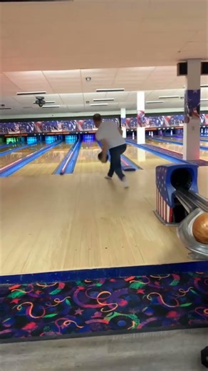 Man Loses Balance While Bowling and Falls