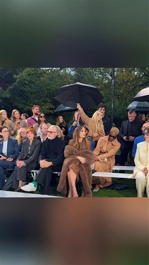 Jennifer Lopez FUMES at Paris Fashion Week After Being Told to Put Her Umbrella Down! ☔😳