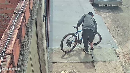 Cyclist Fails to Mount His Bike and Tumbles on Driveway