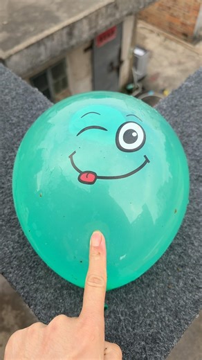 Experiment: Will a water balloon explode if it rolls down a tall building? 💥🎈 #balloon