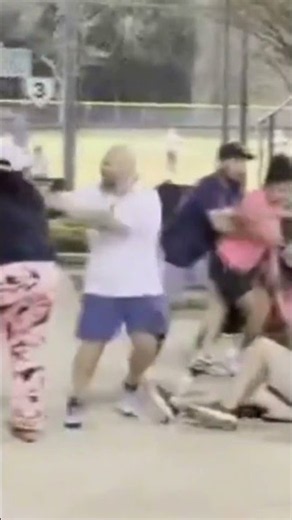 WATCH: A dispute over cheering at a 12-year-old girls' softball game escalated.