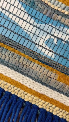 Funky mixed media weaving with cyanotype, handmade paper, raffia and both store bought and hand dyed yarn. 💙 #artistsoftiktok #weaving #cyanotype #wip #timelapseart