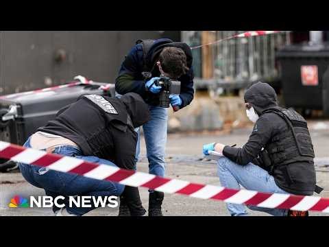 Suspect in custody after one person killed and four injured in shooting outside Paris