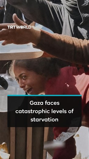 Girl in Gaza struggles while waiting at charity kitchen as aid cuts deepen hunger crisis