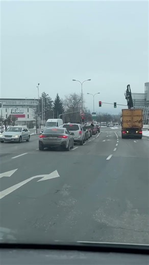 Truck Crane Clips Road Sign and Drops It Onto Cars