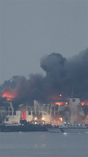 Rescuers evacuate passengers amid Indonesia ferry fire
