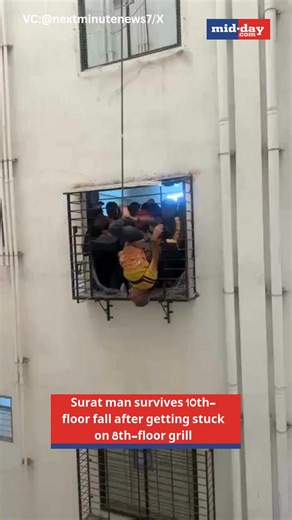 A 57-year-old man in Surat had a narrow escape after falling from the window of his 10th-floor apartment and landing on a grill of the 8th floor. Firefighters rushed to the spot, cut through the grill, and used ropes to safely rescue him. VC:nextminutenews7/X | MiD DAY