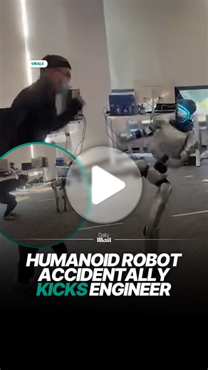 This is the moment a robot in Shanghai, China accidentally kicks an engineer. They were performing a synchronised combat movement when the humanoid misjudged the distance. #robot #humanoid #china | Daily Mail Video