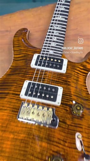 Tremendous Orange Tiger ! 🐅 Stop by the shop to check out this powerful PRS Guitar Custom 24!