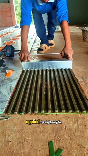 CERAMIC TILE INSTALLATION – ADHESIVE APPLICATION WITH NOTCHED TROWEL