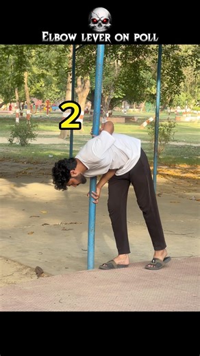 Gravity-Defying Elbow Lever on Pole! ⚖️ #shorts