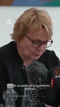 Mourners light candles after deadly German shelter shooting | AJ #shorts