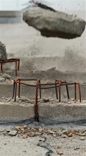 Building roof collapses in explosion dust debris flying.