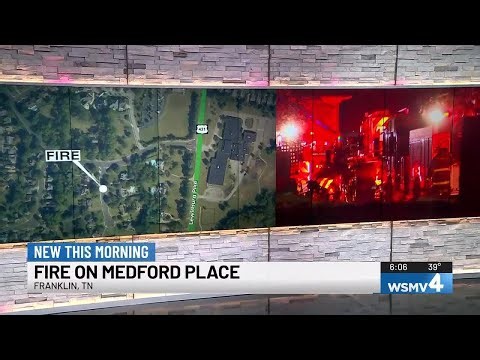 Crews battle house fire as rain pelts down in Franklin