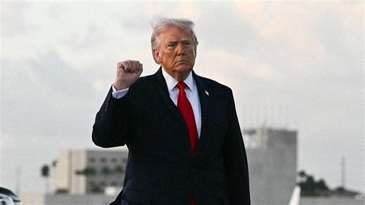 Trump greets Oklahoma State men's golf team with golf swing