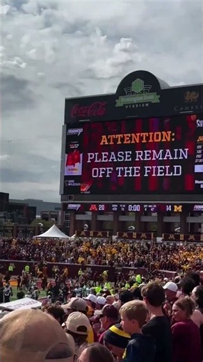 Fans rush the field as Gophers beat Michigan for Little Brown Jug