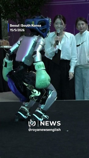 Humanoid robots duel & dance to K-pop