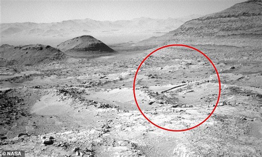 NASA photo of Mars sparks theories of alien life as eagle-eyed viewers spot tracks in the dust